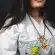 woman in white and yellow cat print collared shirt